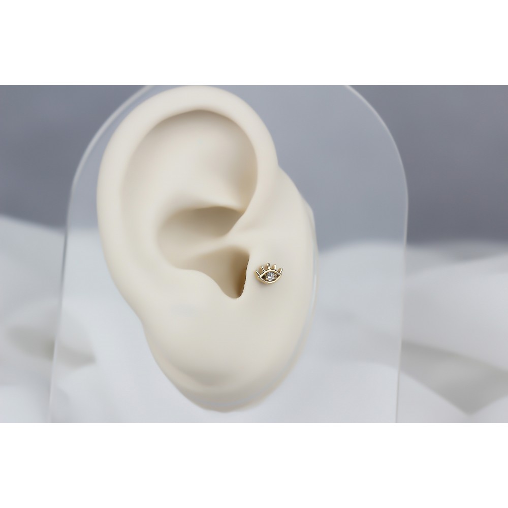 Glorria Altın Göz Tragus Piercing Glorria Altın Göz Tragus Piercing